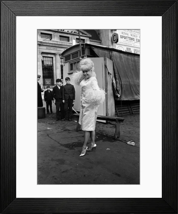 Framed Print : Actress Barbara Windsor in her dress that she plans to wear for the Royal premiere of her Framed Print : Actress Barbara Windsor in her dress that she plans to wear for the Royal premiere of her