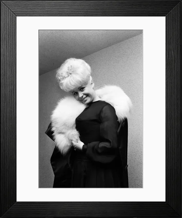 Framed Print : Actress Barbara Windsor in her dress that she plans to wear for the Royal premiere of her Framed Print : Actress Barbara Windsor in her dress that she plans to wear for the Royal premiere of her