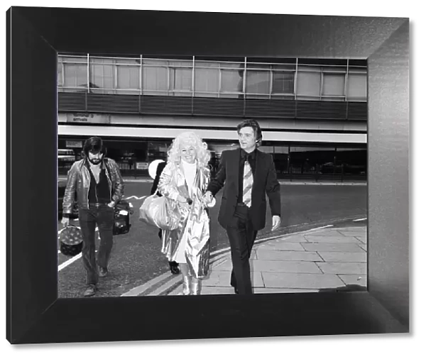 Barbara Windsor and her husband Ronnie Knight arriving at Heathrow Airport from Australia