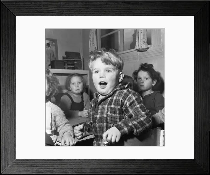 Framed Print : A young pupil at the L. C. C. Day nursery in Regency Street Framed Print : A young pupil at the L. C. C. Day nursery in Regency Street