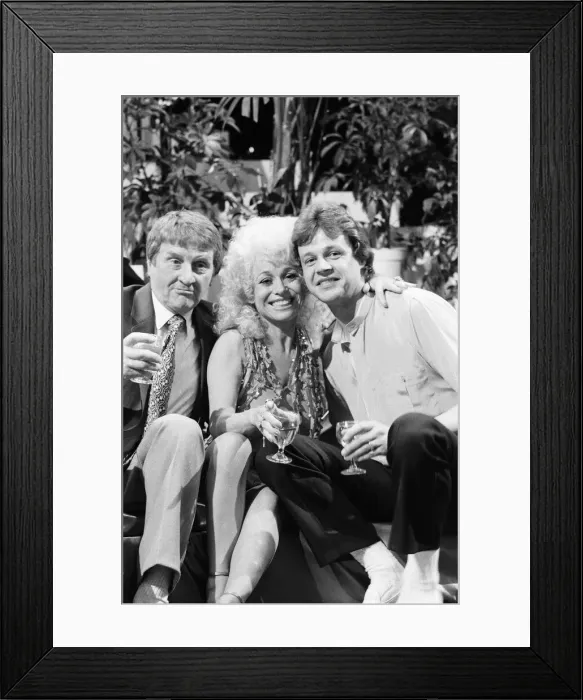 Framed Print : Norman Collier with Barbara Windsor and her boyfriend Stephen Hollings filming a TV show