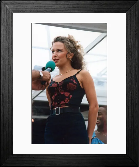 Framed Print : Australian pop singer Kylie Minogue performing on stage at the BBC Radio One Roadshow