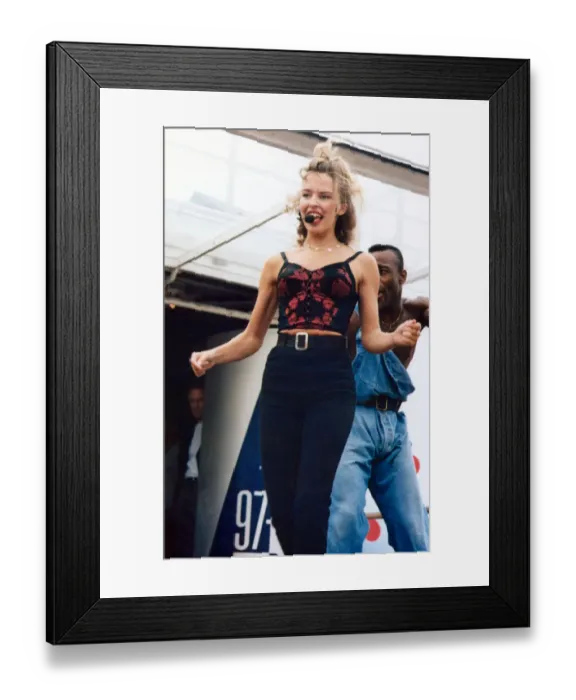 Framed Print : Australian pop singer Kylie Minogue performing on stage at the BBC Radio One Roadshow