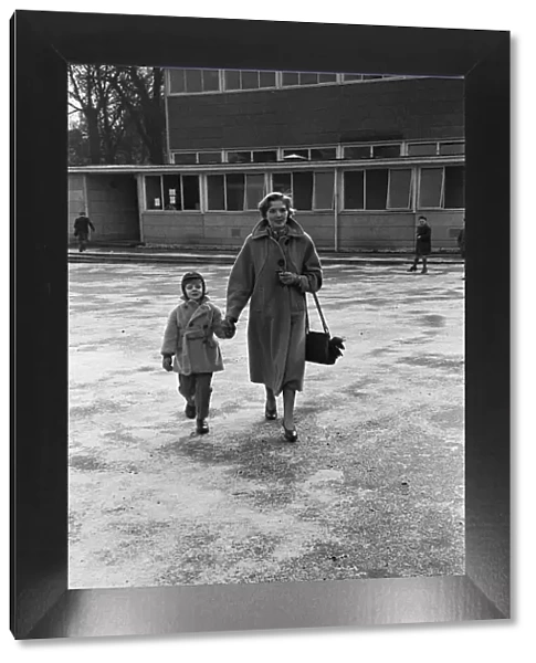 Mother dropping her son off at the South Mead School, Southfield, Wimbledon