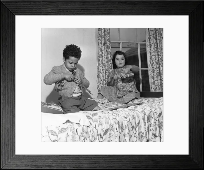 Framed Print : John Johnson (left) aged five plays with his train set with Elizabeth Milland in Framed Print : John Johnson (left) aged five plays with his train set with Elizabeth Milland in