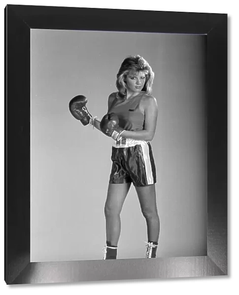 A model showcasing boxing gloves. 7th October 1987