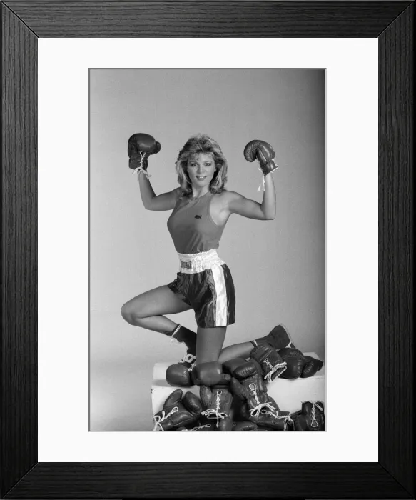 Framed Print : A model showcasing boxing gloves. 7th October 1987 Framed Print : A model showcasing boxing gloves. 7th October 1987
