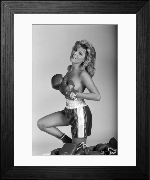 Framed Print : A model showcasing boxing gloves. 7th October 1987 Framed Print : A model showcasing boxing gloves. 7th October 1987