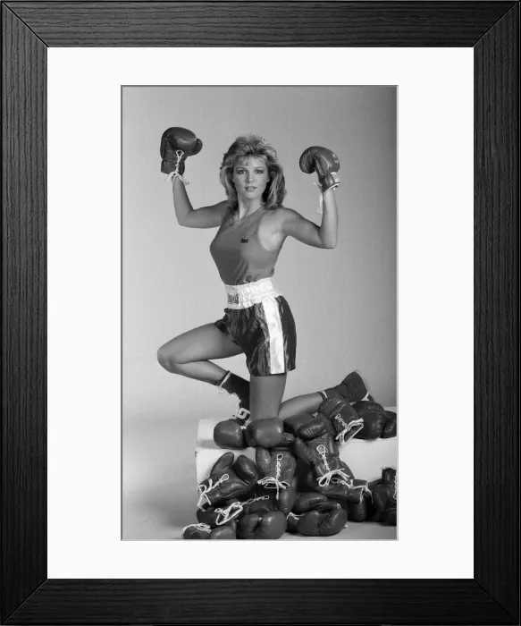 Framed Print : A model showcasing boxing gloves. 7th October 1987 Framed Print : A model showcasing boxing gloves. 7th October 1987