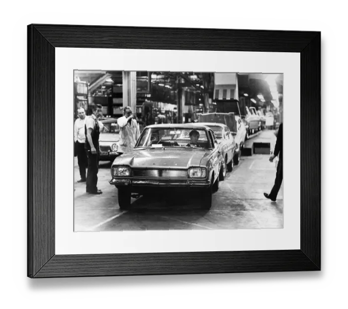 Framed Print : A new Ford Capri car rolls off the production line at the Ford Motor plant in Halewood Framed Print : A new Ford Capri car rolls off the production line at the Ford Motor plant in Halewood
