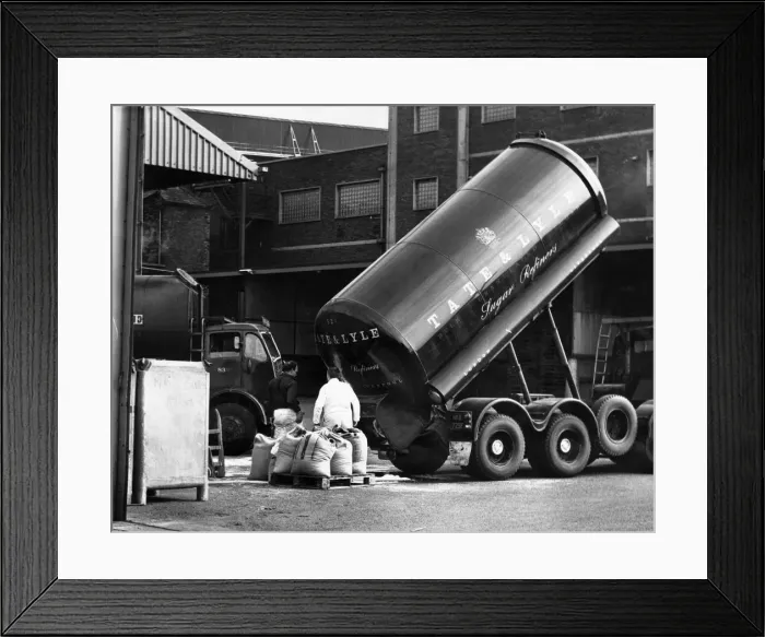 Framed Print : Work in progress at the Tate and Lyle sugar refinery in Love Lane near the docks in Framed Print : Work in progress at the Tate and Lyle sugar refinery in Love Lane near the docks in