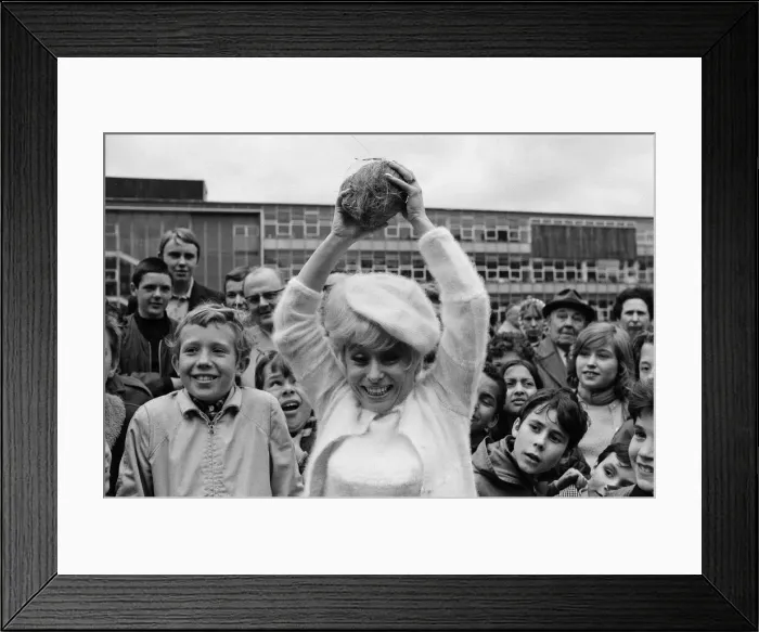 Framed Print : Actress Barbara Windsor was lucky on the coconut shy at The William Ellis School summer