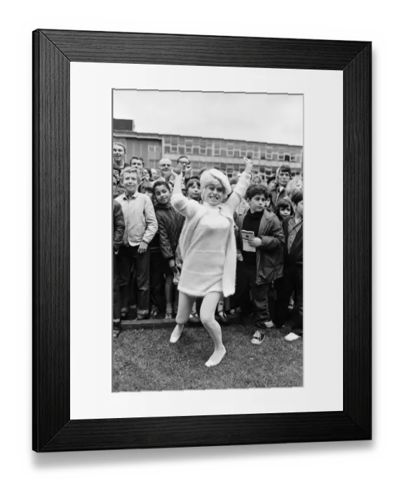Framed Print : Actress Barbara Windsor was lucky on the coconut shy at The William Ellis School summer