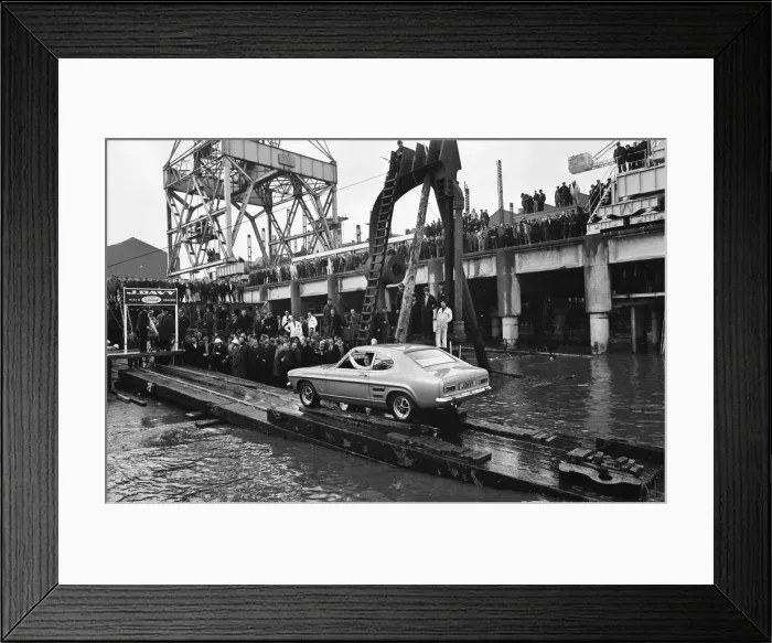 Framed Print : The new Ford Capri, launched in unusual manner off the slipway at the shipbuilding yard Framed Print : The new Ford Capri, launched in unusual manner off the slipway at the shipbuilding yard