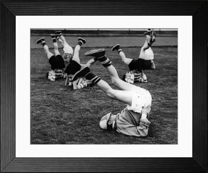 Framed Print : Celtic training, Charlie Tully limbers up. Circa 1955