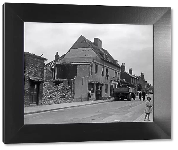 Demolition in an un-named street in Uxbridge circa 1936