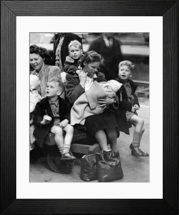 Framed Print : Mrs Gwen Heads, of Kensal Rise, London, with her three boys and 2 month old baby girl Framed Print : Mrs Gwen Heads, of Kensal Rise, London, with her three boys and 2 month old baby girl