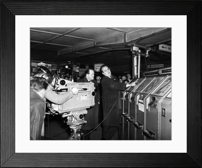 Framed Print : Richard Dimbleby filming for French television at Victoria Station. 9th March 1956 Framed Print : Richard Dimbleby filming for French television at Victoria Station. 9th March 1956