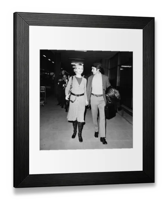 Framed Print : Goldie Hawn, American actress with husband Gus Trikonis, at London Heathrow Airport