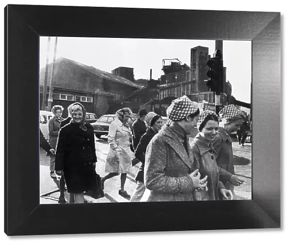 Female workers of the Tate and Lyle sugar refinery in Liverpool make their way to