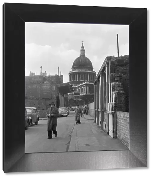 City workers view of St Pauls Cathedral as they make their way down Watling Street