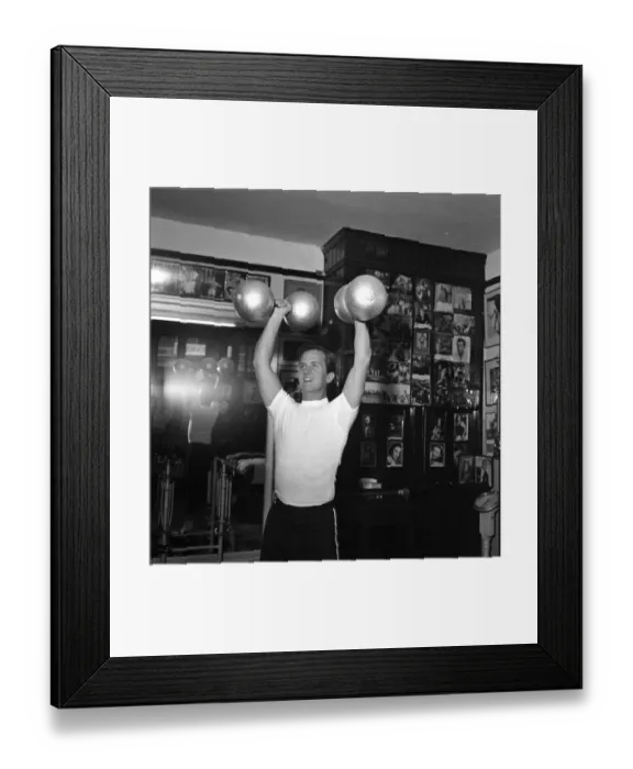 Framed Print : American singer, Pat Boone, exercises for his part in his next film