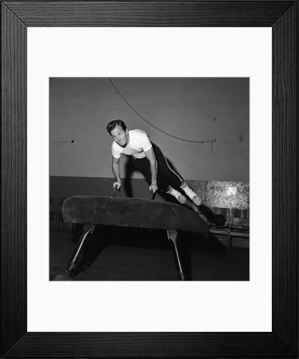 Framed Print : American singer, Pat Boone, exercises for his part in his next film Framed Print : American singer, Pat Boone, exercises for his part in his next film