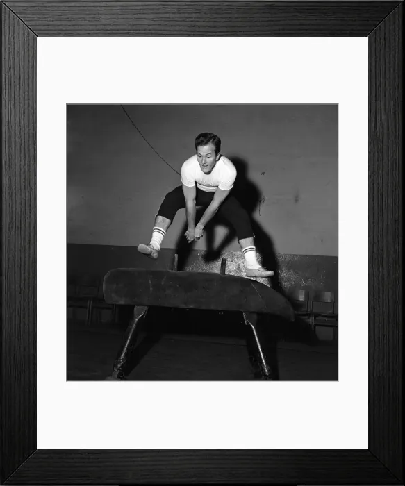 Framed Print : American singer, Pat Boone, exercises for his part in his next film Framed Print : American singer, Pat Boone, exercises for his part in his next film