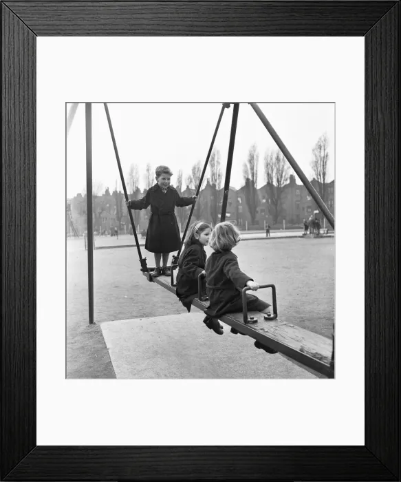 Framed Print : Children on the swings at Paddington recreation grounds. 30th March 1954 Framed Print : Children on the swings at Paddington recreation grounds. 30th March 1954