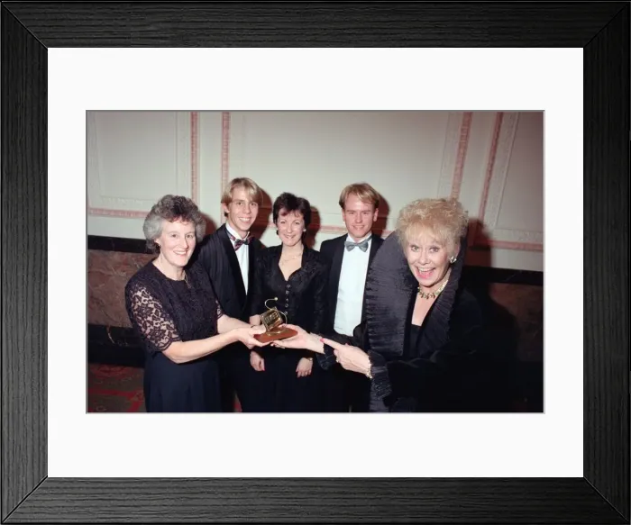 Framed Print : Evening Mail reader Mrs Brenda Ward of Walsall (left), presents the Soap of the Year Framed Print : Evening Mail reader Mrs Brenda Ward of Walsall (left), presents the Soap of the Year