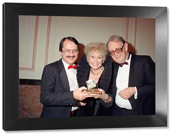 Actress Liz Dawn of Coronation Street with her Soap of the Year Trophy