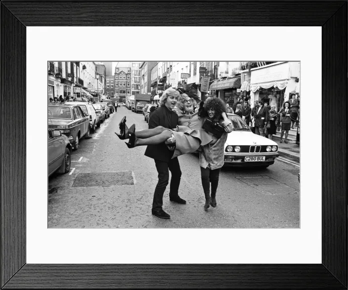 Framed Print : Barry Humphries in character as Dame Edna Everage with designers David