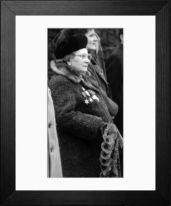 Framed Print : Remembrance Sunday in Rhyl, Denbighshire, Wales. Betty Hughes ready to lay her