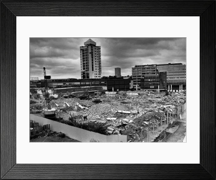 Framed Print : The end of an era, Coventrys West Orchard multi-storey carpark lies flattened in a Framed Print : The end of an era, Coventrys West Orchard multi-storey carpark lies flattened in a