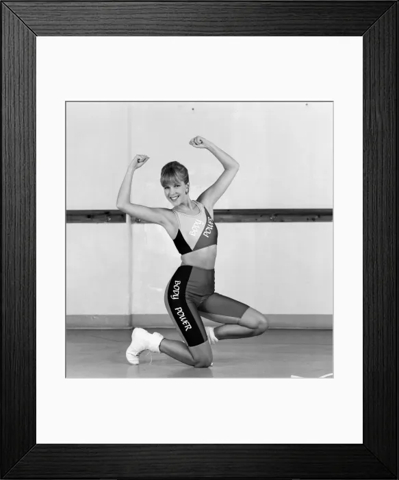 Framed Print : A model wearing stretch fashions. 3rd February 1988