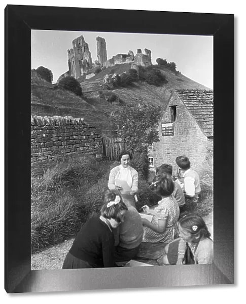 Pupils sketching Corfe Castle during a school visit to the ruins of the 11th century
