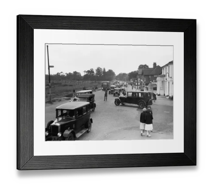 Framed Print : A a patrolman directs August Bank Holiday traffic outside The Orleans Arms situated