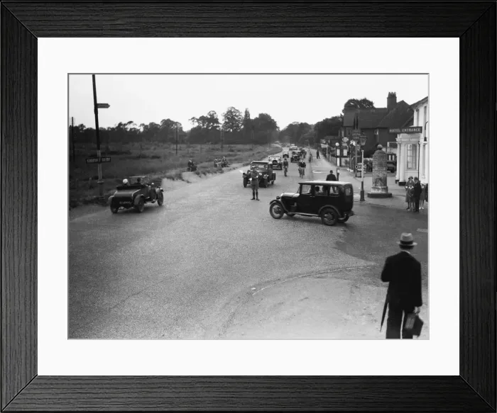 Framed Print : A a patrolman directs August Bank Holiday traffic outside The Orleans Arms situated Framed Print : A a patrolman directs August Bank Holiday traffic outside The Orleans Arms situated