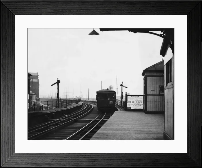 Framed Print : The famous Overhead Railway in Liverpool, with the train stopped at James Street Station