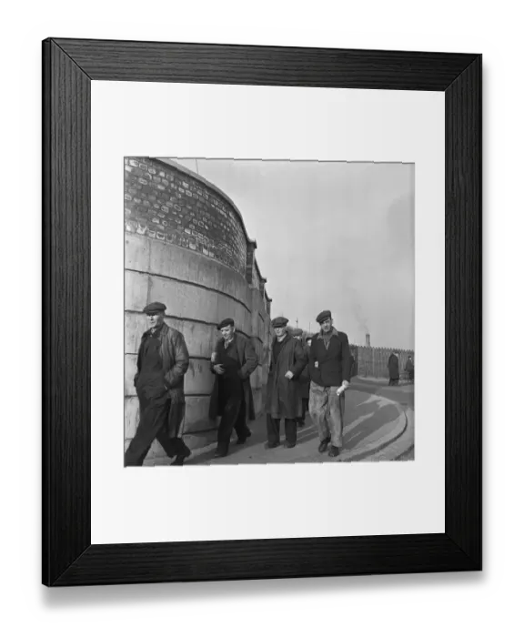 Framed Print : Knocking off of work are the shipyard workers of P. S. Austin shipyards on the river Wear