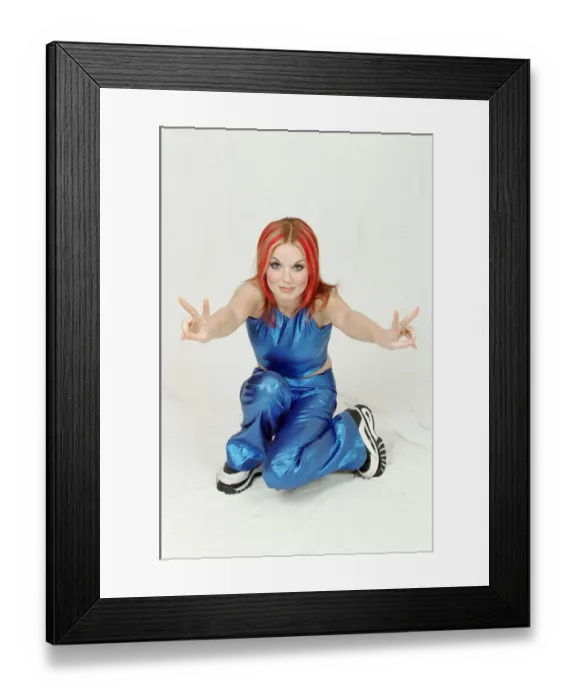 Framed Print : Geri Hailliwell, (famously known as Ginger Spice) pictured here in a photo shoot for Framed Print : Geri Hailliwell, (famously known as Ginger Spice) pictured here in a photo shoot for