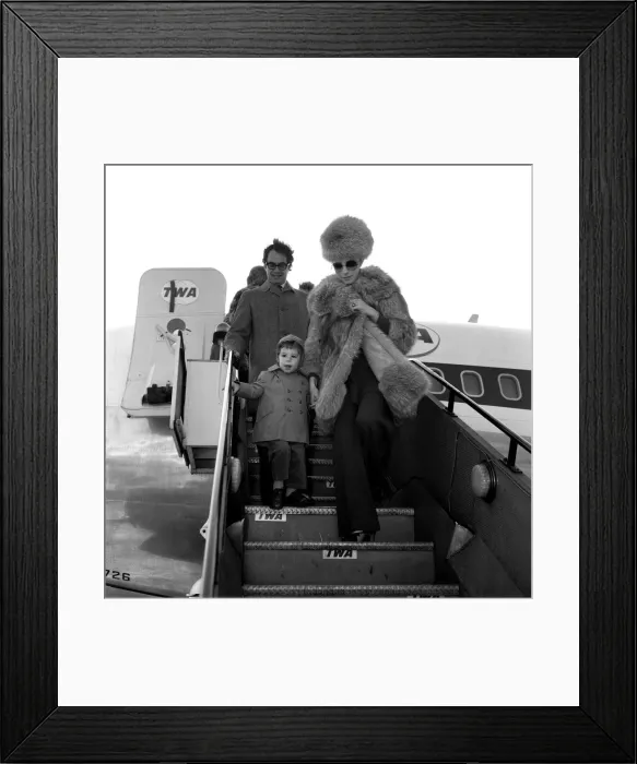 Framed Print : Barbra Streisand arrives at Heathrow Airport with her son Jason Gould