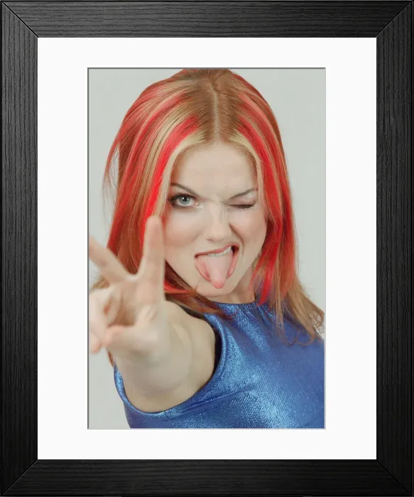 Framed Print : Geri Hailliwell, (famously known as Ginger Spice) pictured here in a photo shoot for Framed Print : Geri Hailliwell, (famously known as Ginger Spice) pictured here in a photo shoot for
