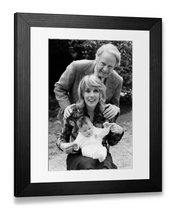 Framed Print : Esther Rantzen at home with her baby daughter Emily and husband Desmond Wilcox Framed Print : Esther Rantzen at home with her baby daughter Emily and husband Desmond Wilcox