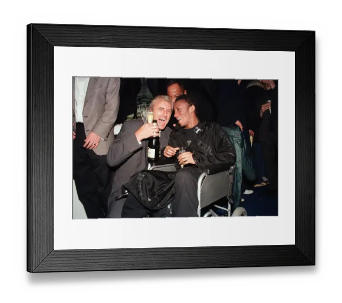 Framed Print : Musician Tricky, in a wheelchair pictured with another guest at the Brit Music Awards Framed Print : Musician Tricky, in a wheelchair pictured with another guest at the Brit Music Awards