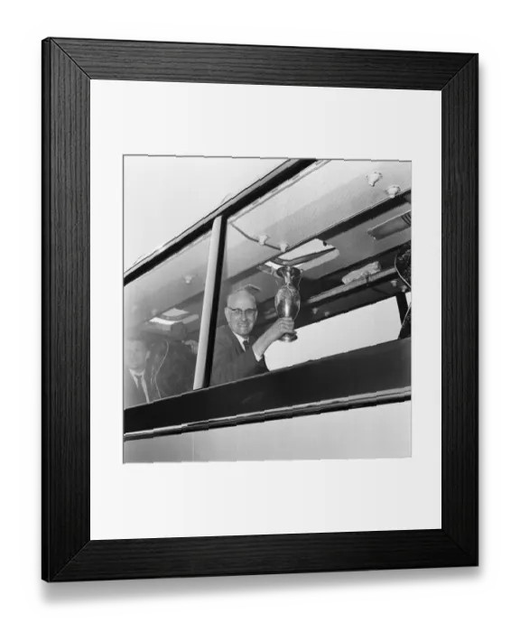 Framed Print : Mr. T V Williams, President of Liverpool Football Club, showing off the trophy brought