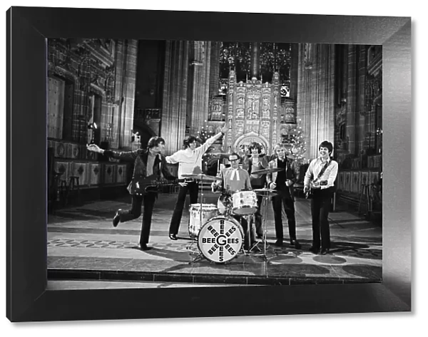 The Bee Gees perform at Liverpool Anglican Cathedral. The Bee Gees are brothers Maurice