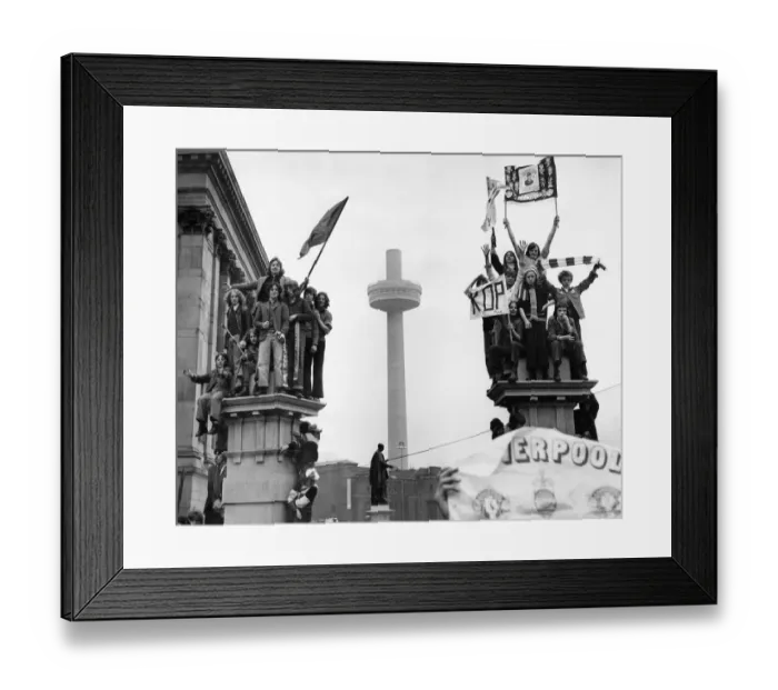 Framed Print : Young fans of Liverpool FC gather in the city centre to welcome their heroes home