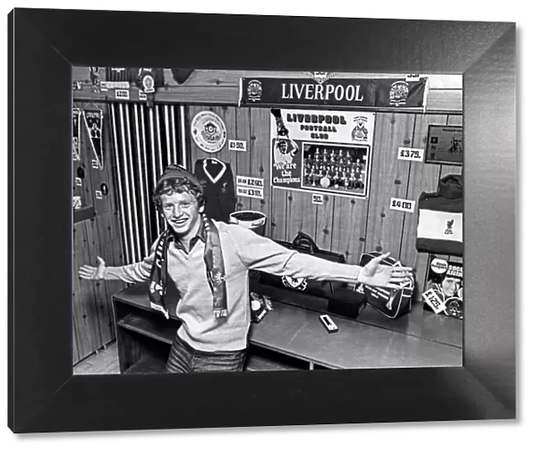 Liverpool footballer David Fairclough poses at the new club Souvenir shop at Anfield