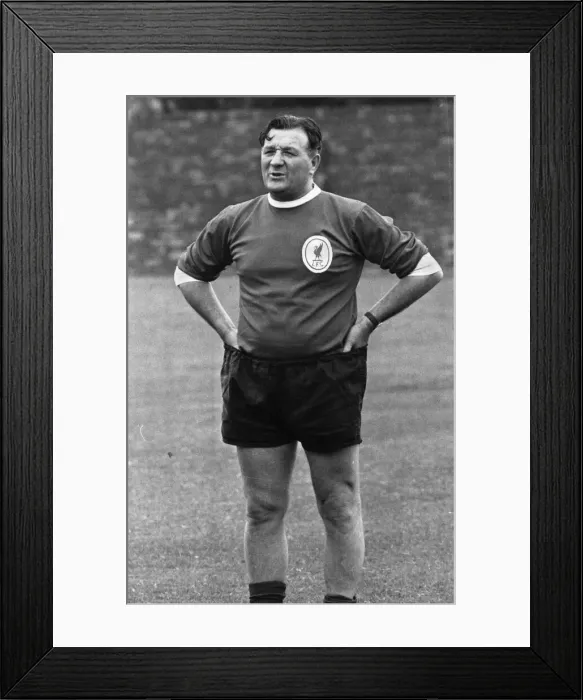 Framed Print : Liverpool assistant manager Bob Paisley wearing the club shirt as he directs a training Framed Print : Liverpool assistant manager Bob Paisley wearing the club shirt as he directs a training